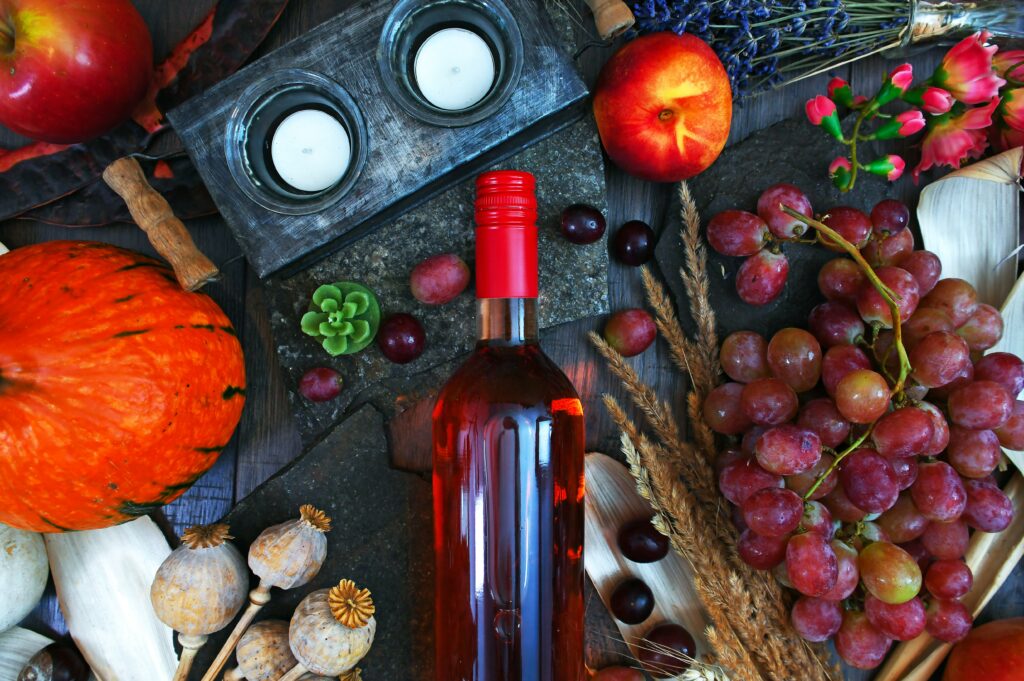 Food and wine bottle laid out on a surface