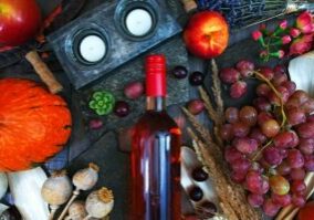 Food and wine bottle laid out on a surface